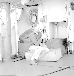 Dave Folger working with instrument on deck