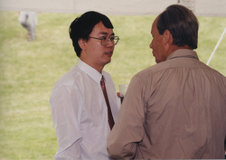 Graduate Wen Xu talking with Jake Peirson.
