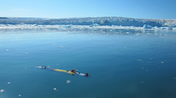 A REMUS 100 "ICEBOT" a the surface of a Greenland fjord.