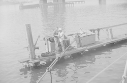 R/V Atlantis tied up at Lake Charles, Louisiana dock during World War II.