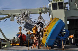 Coastal Surface Mooring buoy loaded onto R/V Knorr for OOI deployment.