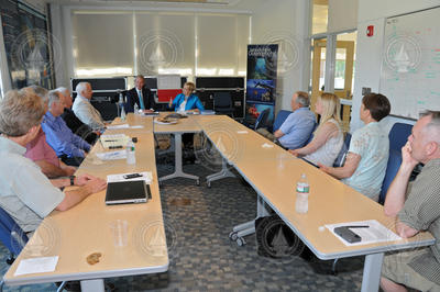 U.S. Senator Edward Markey talking with Susan Avery and other WHOI personnel.