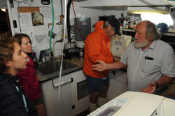 Jim Doutt talking to students down in the RV Tioga lab.
