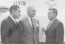 Al Vine (R) and two unidentified men standing next to Alvin