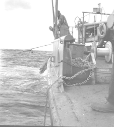 Unidentified men on the deck of the Chain
