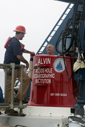 Bruce Strickrott helping RADM Nevin Carr board DSV Alvin.