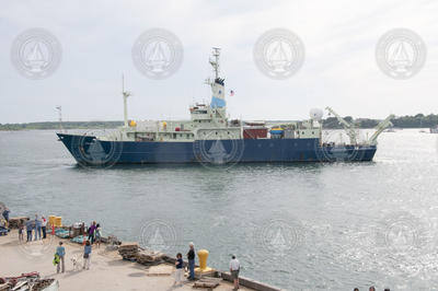 Full port side profile of R/V Knorr as she leaves WHOI dock.