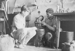Maurice Ewing [L] and J. Lamar Worzel with pressure test chamber