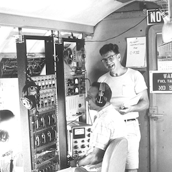Andrew Bunker [right] and Ed Denton aboard C-54Q airplane