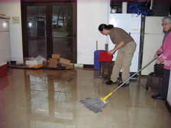 Cleanup in McLean basement after flooding from heavy rains.