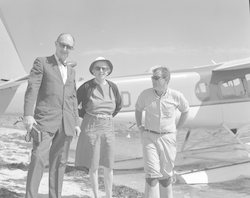 Captain Scott, Robert Weeks and Dot Rogers near heliocourier.