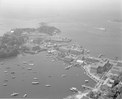 Aerial view of Woods Hole, including Eel Pond and WHOI dock