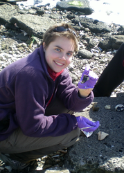 JP student Karin Lemkau holding up an oil spill sample.