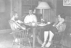 Charles Renn, Rudolph Nunnemacher and Mary Sears in Bigelow library.
