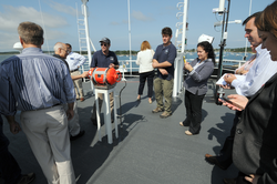 Captain Mike Hoshlyk showing the tour group around R/V Sikuliaq.