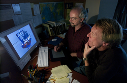 Jim Broda (front) and Jack Cook working on the long core proposal animation.