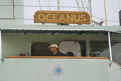 Oceanus captain Diego Mello up on the bridge level docking the ship.