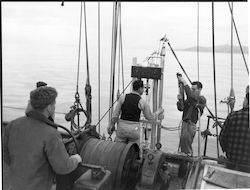 Nat Corwin (center) and Val Worthington (right) with Hydro station