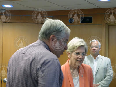 Glen Gawarkiewicz briefing Senator Elizabeth Warren.