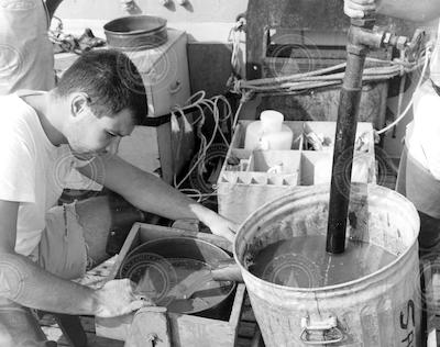 George Hampson sieving sediment samples.