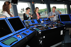 NSF associates touring R/V Sikuliaq's bridge.