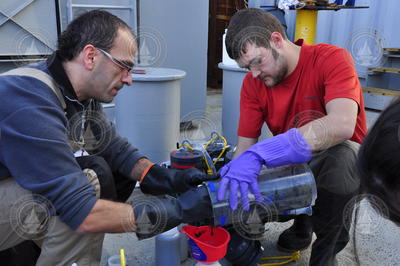Konstantinos Kormas and Colin Morrison processing recovered sediment samples.