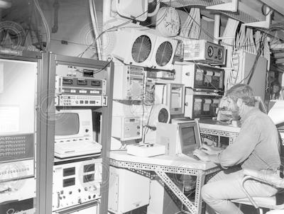 Thomas Aldrich working in computer lab aboard Knorr