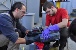 Konstantinos Kormas and Colin Morrison processing recovered sediment samples.