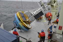 OOI surface buoy recovery to deck of R/V Knorr.