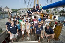 Group photo of JP students and SEA crew (dark blue shirts).