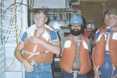 Group wearing flotation vests, aboard Knorr