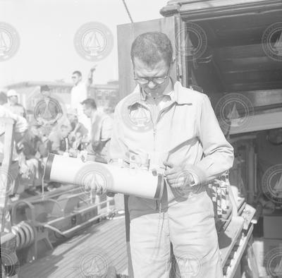 Dick Richards with Van Dorn bottle onboard Bear.