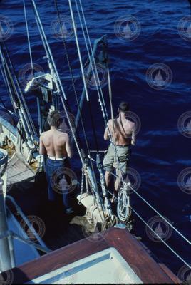 Two men working on deck