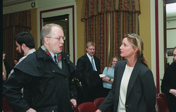 Ruth Curry (right) speaking with one of the guests at the briefing