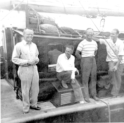 J. B. Hersey, Paul F. Smith, Frank Mather and Dave Owen on deck of Caryn on cruise 11