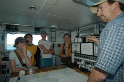Captain Ken Houtler teaching the basics of navigation.
