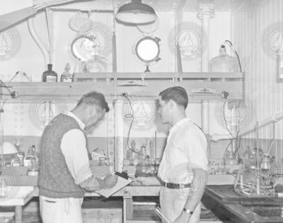 Alfred Redfield and Homer Smith in the lower lab of the Atlantis.