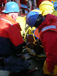 Jim Ryder and Fiamma Straneo with a recovered ADCP on deck.