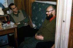 Red Wright and John Swallow in ship's lounge.