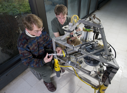 Bill Martin and Carl Lamborg with benthic chamber that measures mercury.