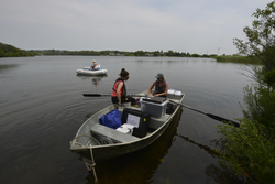 Carl Lamborg, Julia Diaz and Colleen Hansel prepare to sample water in Oyster Pond.
