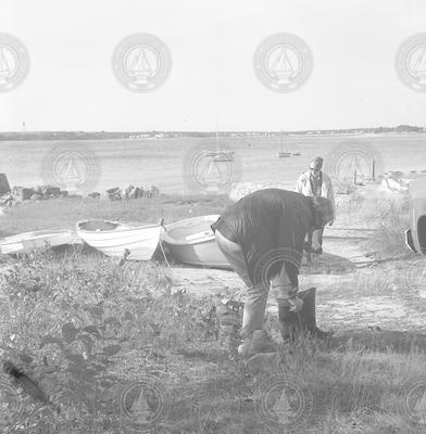 Howard Sanders and George Hampson preparing to examine oil spill.