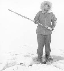 Lloyd "Tex" Hoadley with ice coring instrument