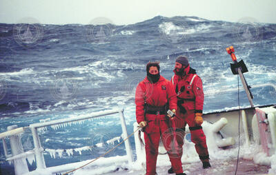 Gwyneth Hufford and Mike Ohmart standing watch on R/V Knorr.