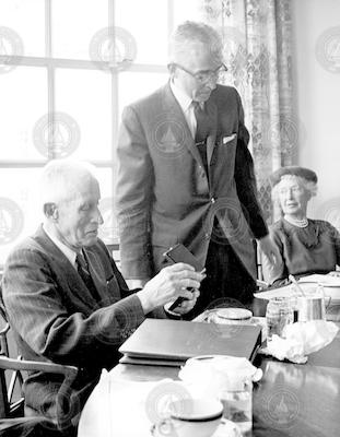 Henry Bigelow admiring first Bigelow Medal, with Paul Fye, and Mrs. Elizabeth Bigelow.
