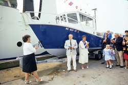 Cynthia Dorman (left) christening the WHOI research boat Mytilus.