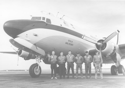 Crew of the WHOI C54Q in front of the aircraft.