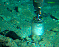 Alvin manipulator using a corer to sample during Alvin dive 3814.