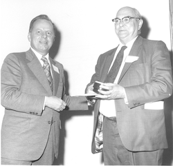 Bostwick Ketchum posing with David Stone Award