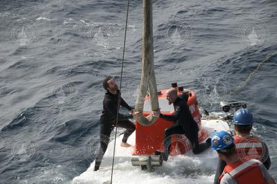 Ronnie Whims and Patrick Neumann attach Alvin lift line for recovery.